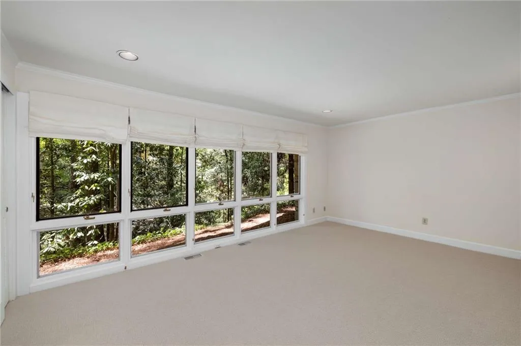 One of three large bedrooms