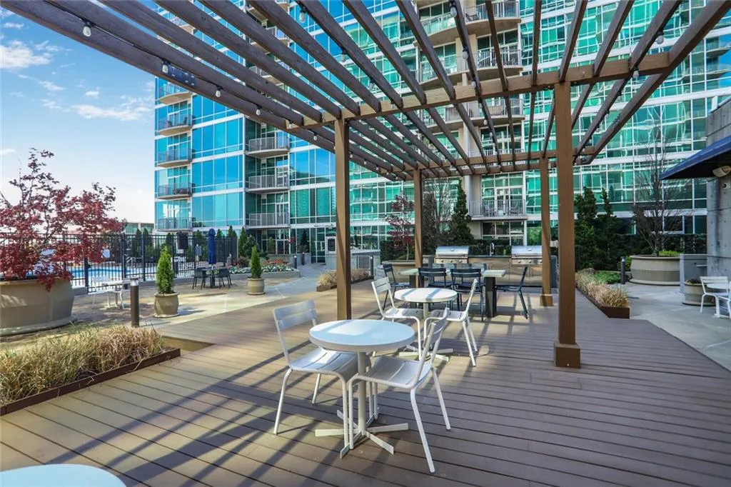 Deck featuring a pergola