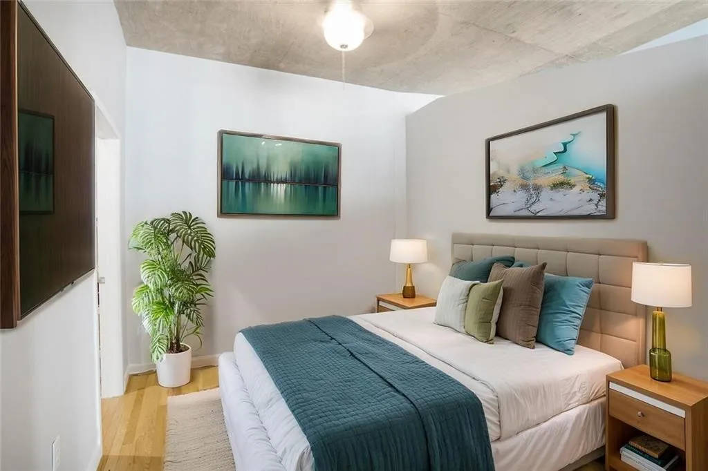 Bedroom featuring wood finished floors