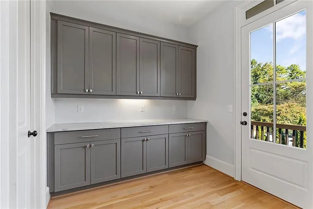 Scullery; walk-in pantry left door and balcony right door