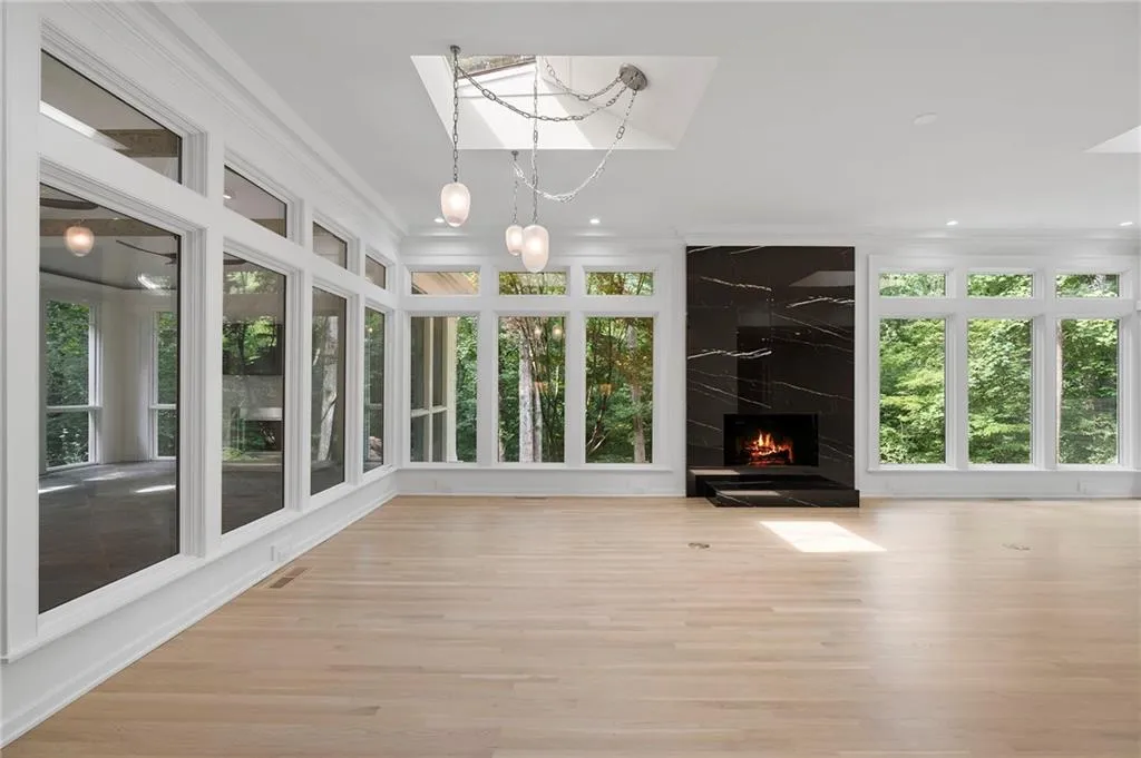 Spacious room with light wood-finish flooring