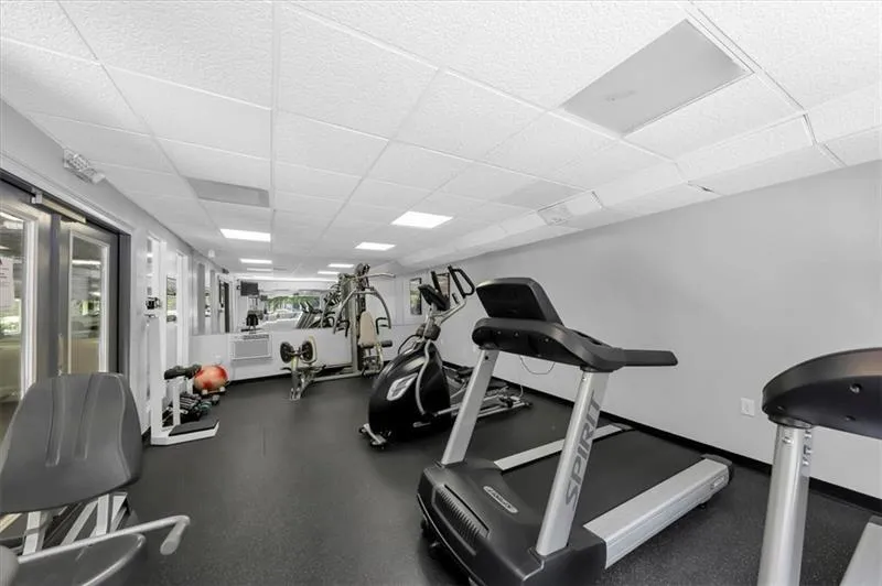 Exercise room featuring a drop ceiling