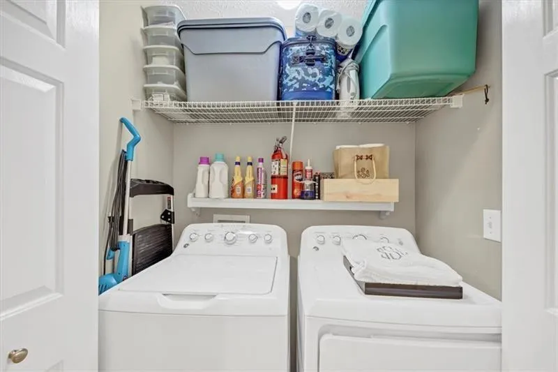 Clothes washing area with washer and dryer