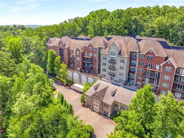 This is a real aerial photo of The Greystone at Vinings Condominium located at 3280 Stillhouse Ln SE, Atlanta, GA 30339.  Unit 410 is one of the 58 Condominiums. Suite 410 is a Penthouse on the top 2 floors.