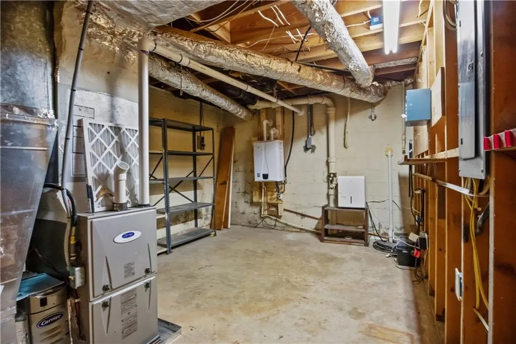 Basement featuring water heater Basement featuring water heater