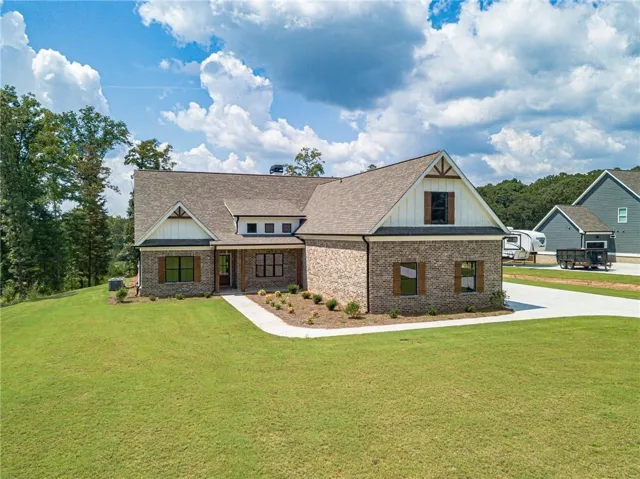 Brick and siding exterior with gabled roof lines