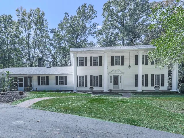 View of front of home with a front lawn