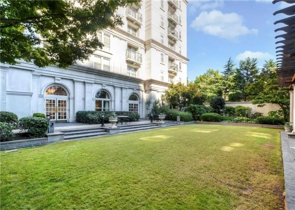 View of yard featuring french doors