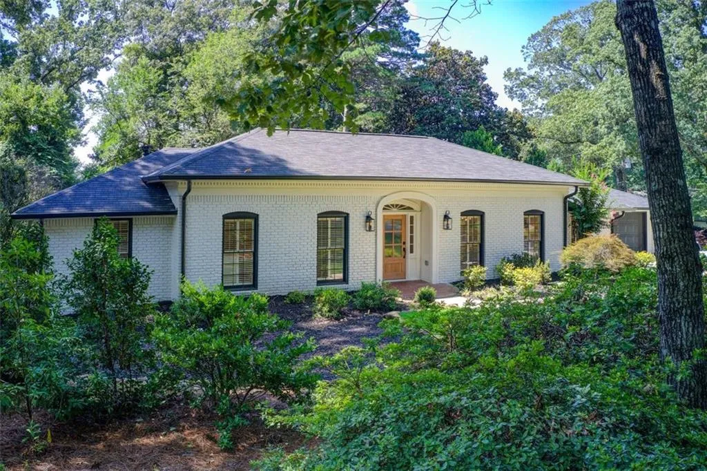 Freshly painted with new gutters & round downspouts.