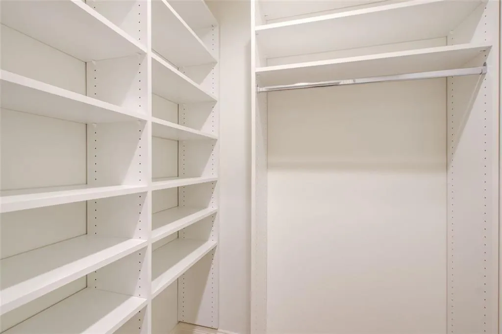 Custom walk-in linen closet! An organizer's dream come true.