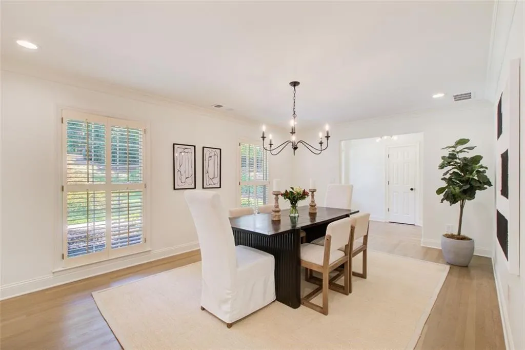 Banquet sized dining room with new chandelier.