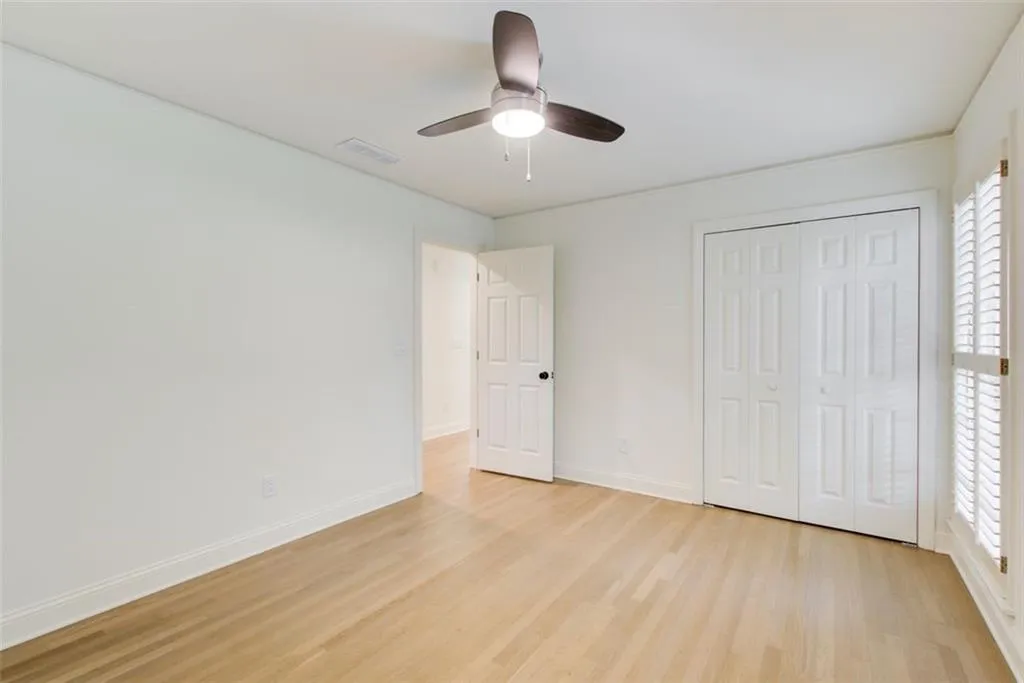 Guest bedroom #1 has two closets & beautiful white oak hardwoods