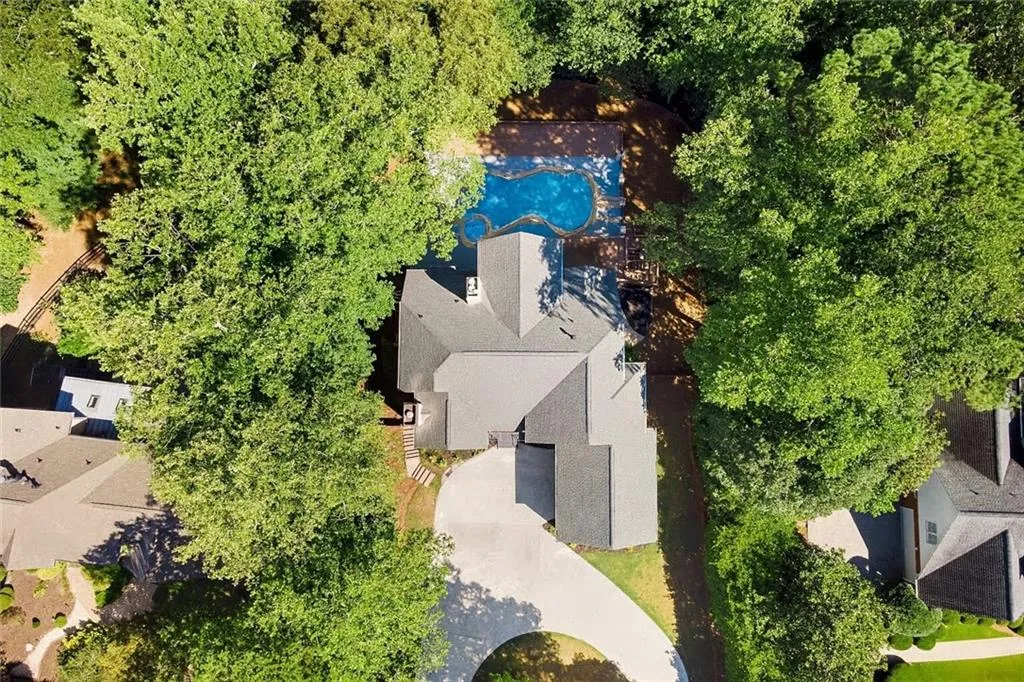 View from above of property featuring a pool