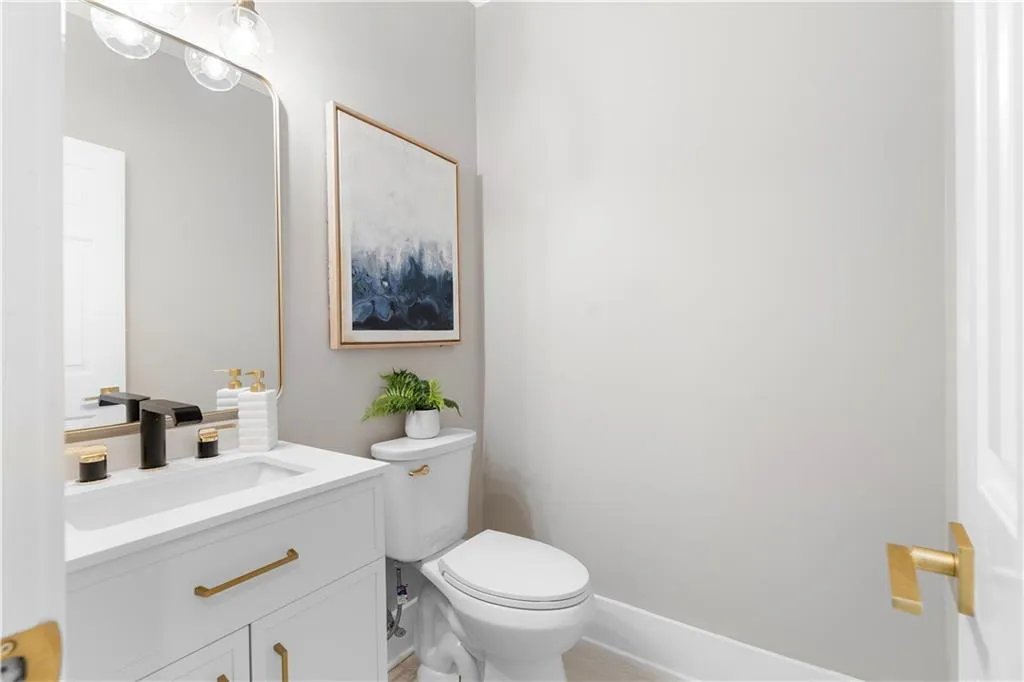 Bathroom with toilet and vanity
