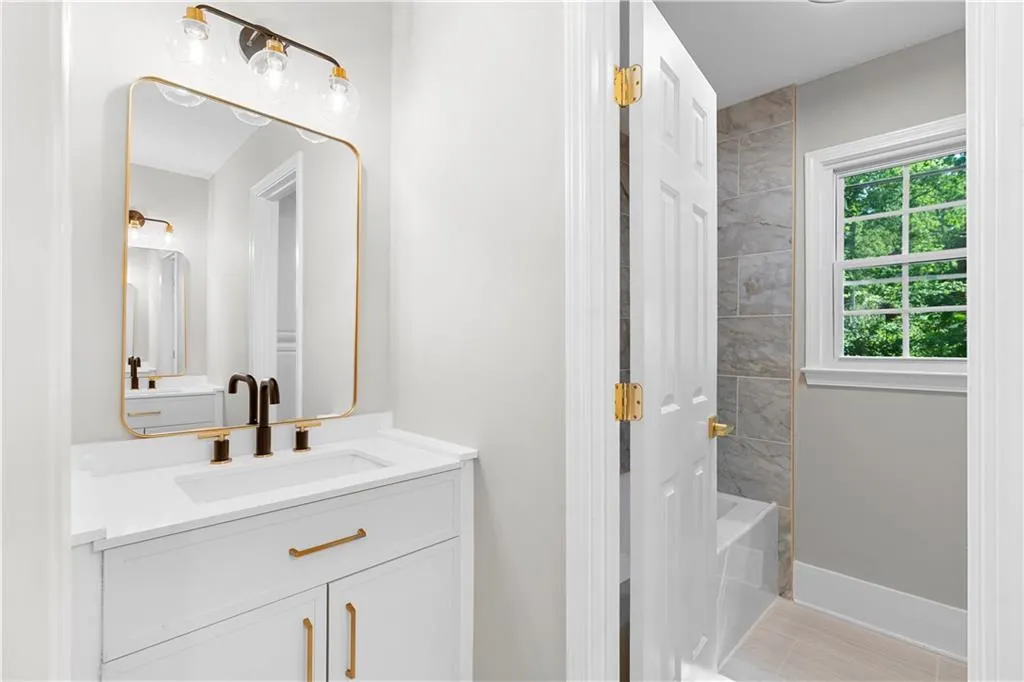 Full bathroom featuring vanity and tub / shower combination