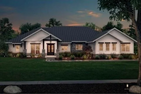 Contemporary ranch-style residence featuring a prominent front entrance with double doors and decorative columns