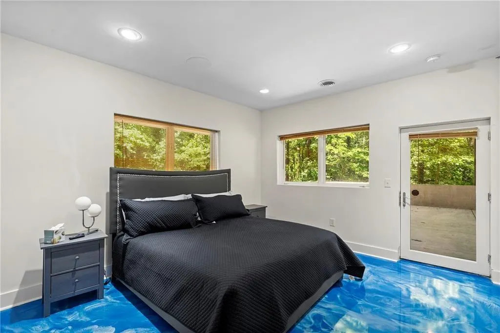 Bedroom featuring access to outside and recessed lighting