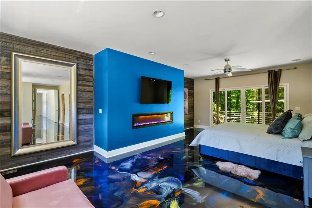 Bedroom with ceiling fan, access to outside, recessed lighting, and a fireplace