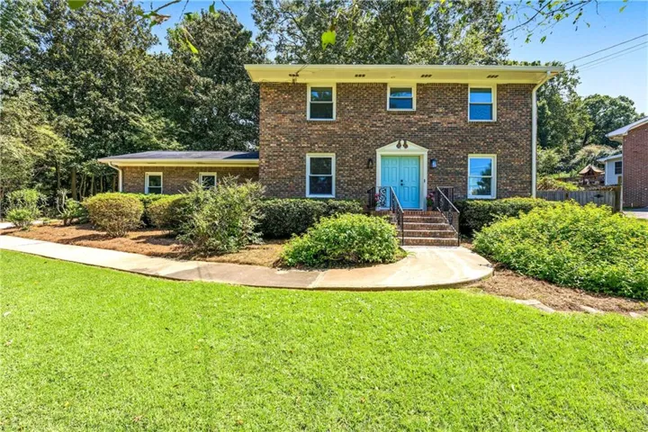 Brick exterior with white trim