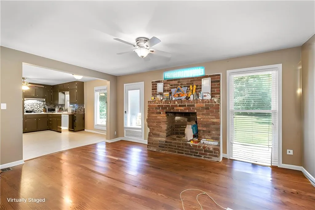The original family room space now open to living and kitchen.