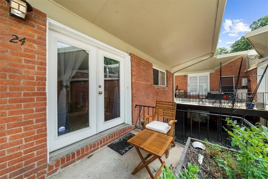 Balcony featuring french doors
