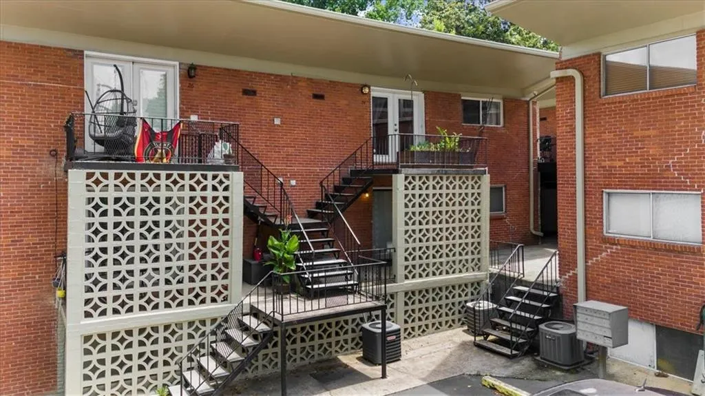View of patio / terrace with stairs and french doors