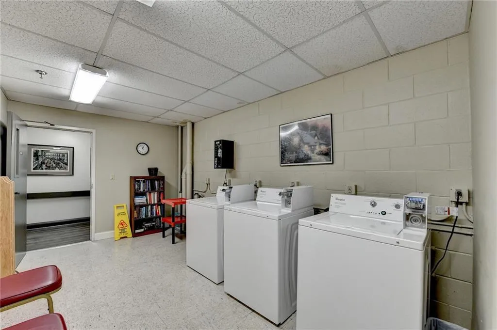 Laundry room featuring separate washer and dryer