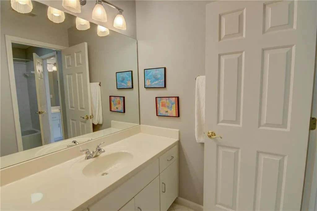 Full bath featuring vanity