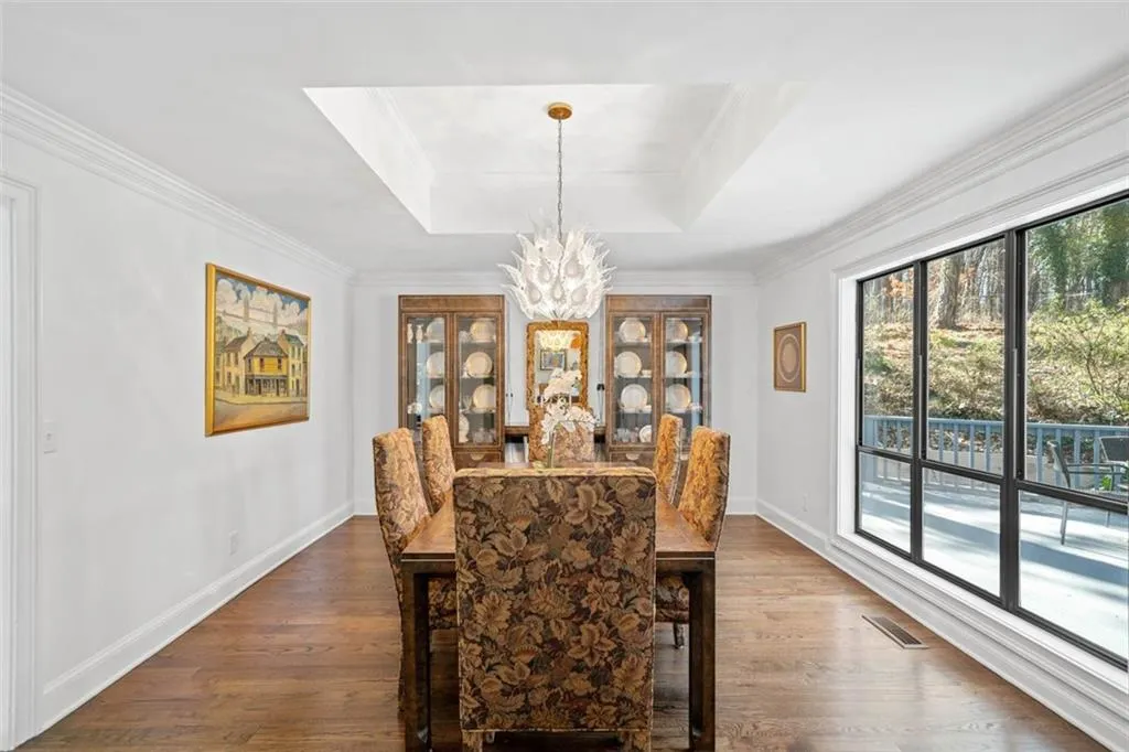 Large separate dining room with enough room to seat many friends or family members