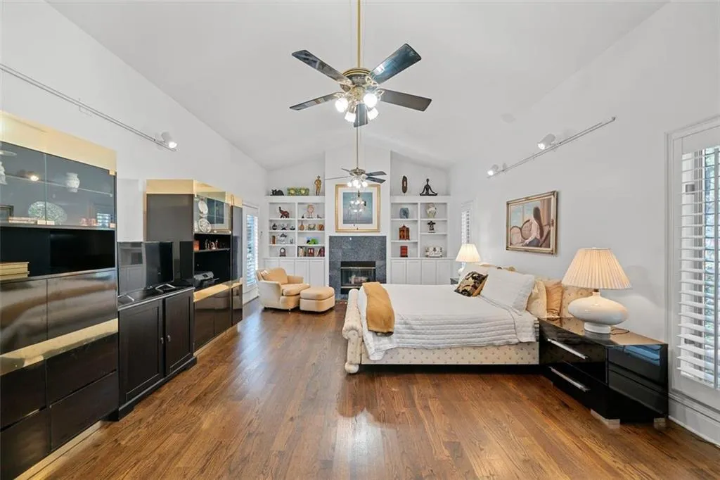 WOW. Oversized primary suite with fireplace on main