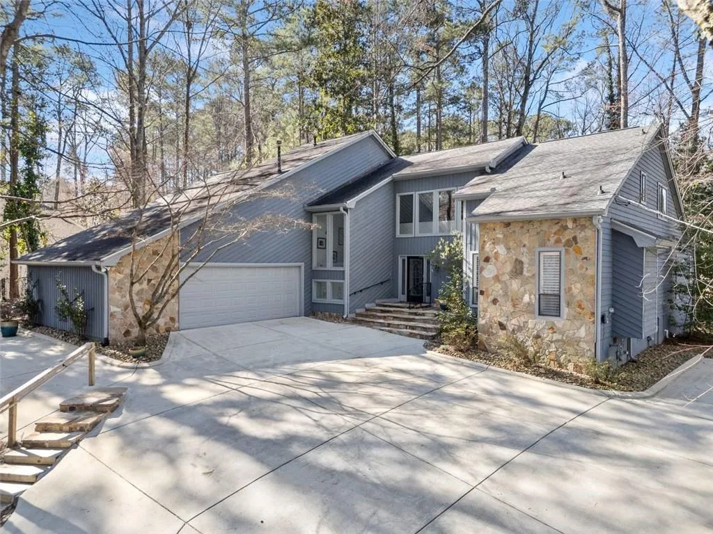 Lots of guest parking and turnaround space. New driveway!