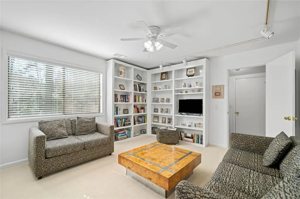 1 of 3 generous secondary bedrooms on 2nd level w/built-ins, walk-in closet plus walk in attic storage