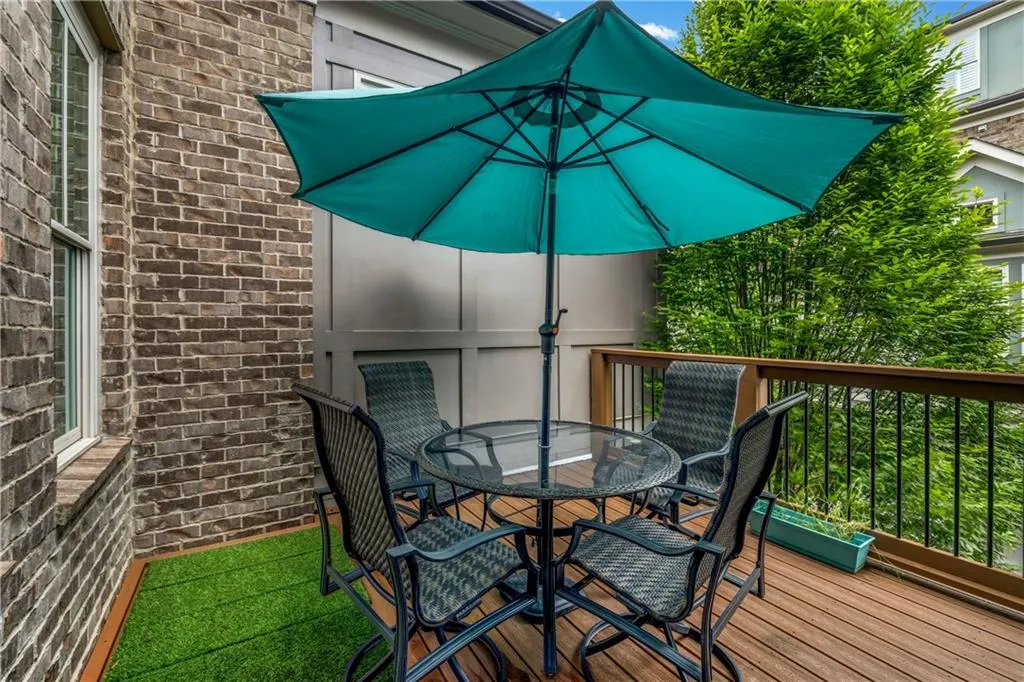 Wooden terrace with outdoor dining area