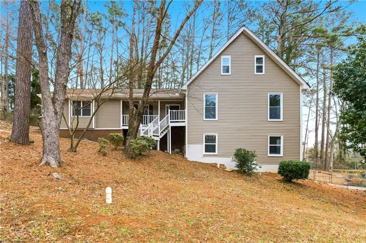 View of front of house featuring stairway