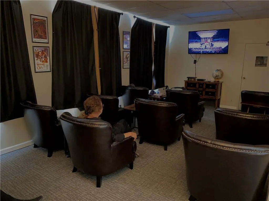 Carpeted media room for feature movies.