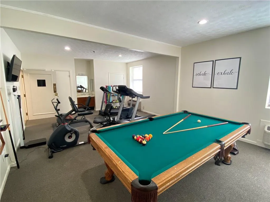 Pool room and exercise room.