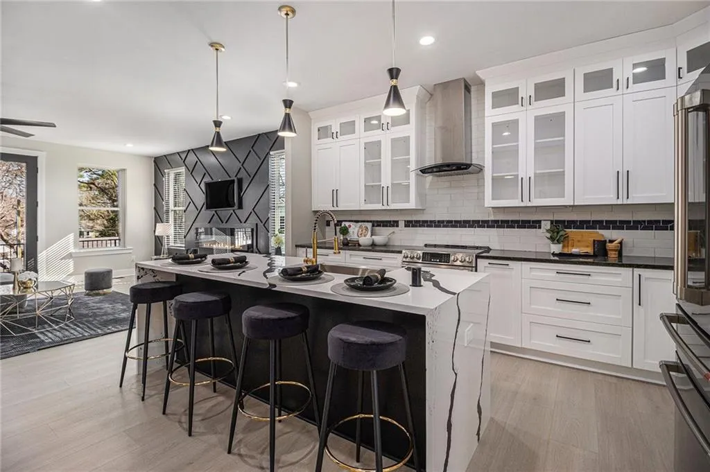 Island with waterfall countertop Island with waterfall countertop