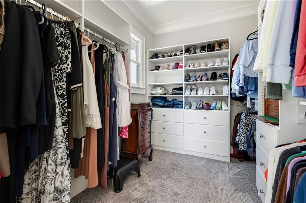 Custom his/her closets in primary suite