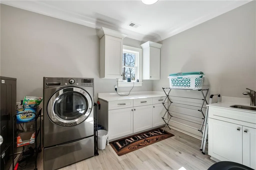 Laundry room located on second level close to bedrooms