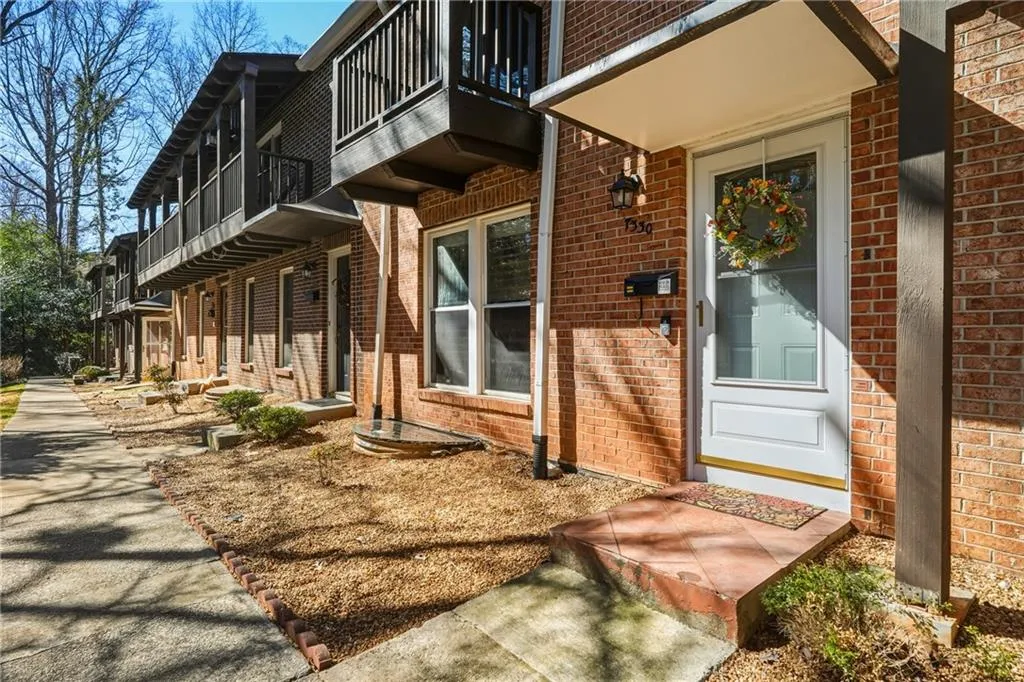 Property entrance with brick siding