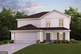 Two-story residence featuring white siding and a brown shingled roof