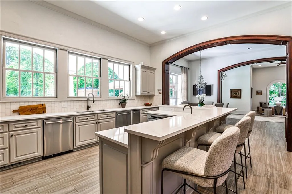 Kitchen opens to informal eating area and family room.