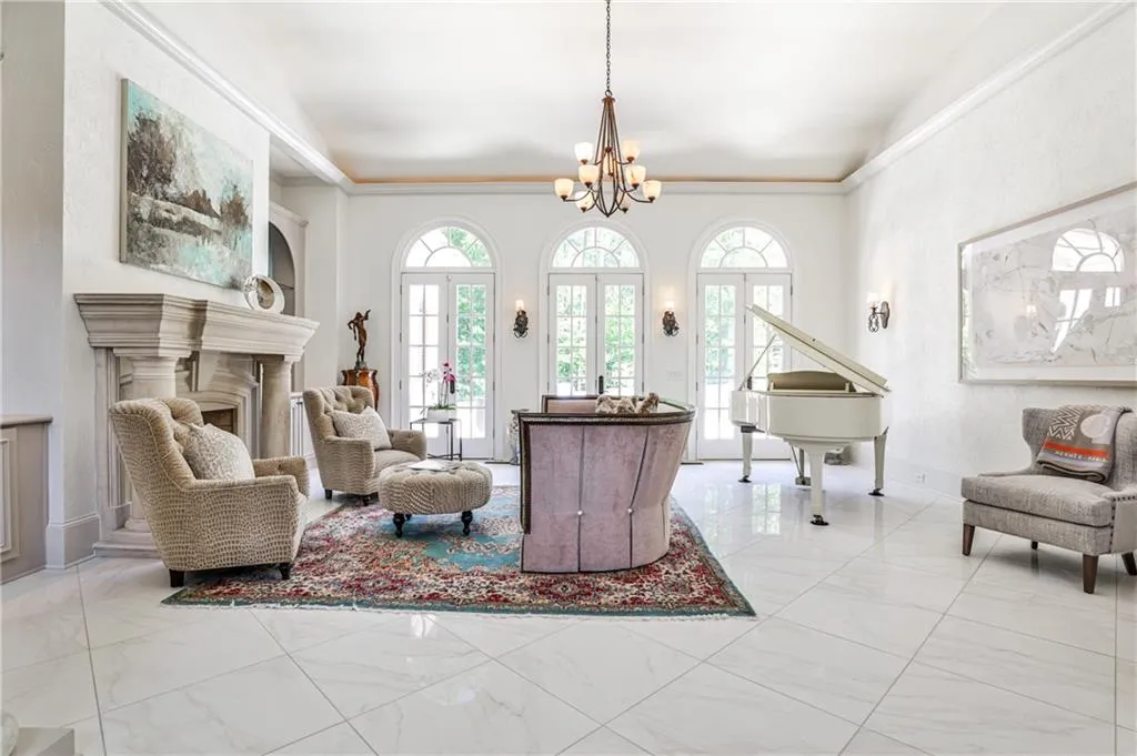 Living room with custom stone fireplace.