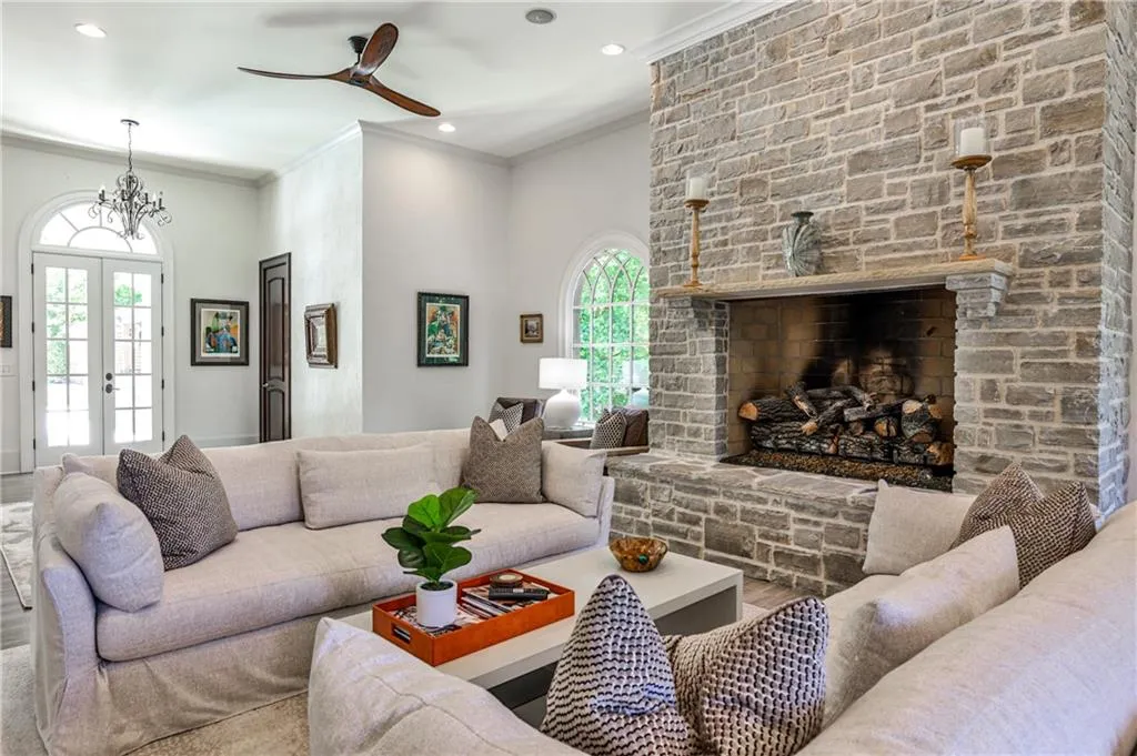 Family opens to both the front terrace and back patio, leading to pool area.