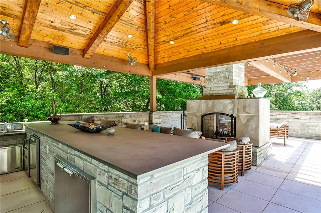 Outdoor cooking area with full kitchen.