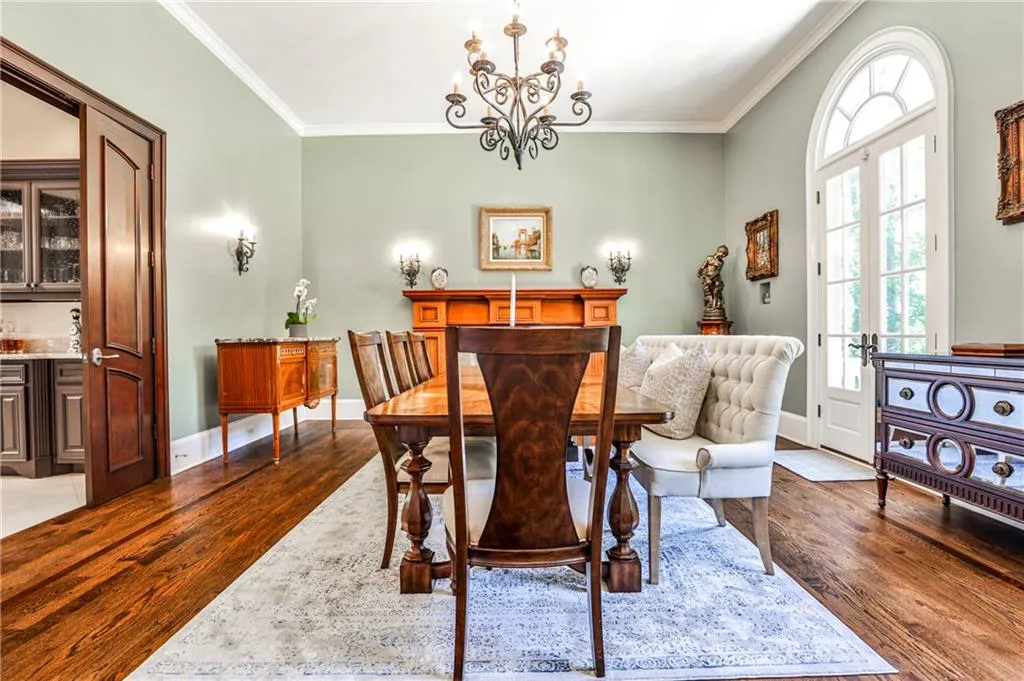 Butler's pantry on the left leads from the dining room into the kitchen.
