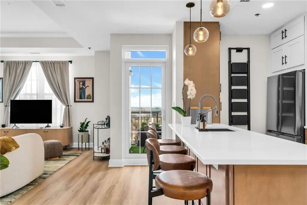 The kitchen island was extended to create a sitting bar area.