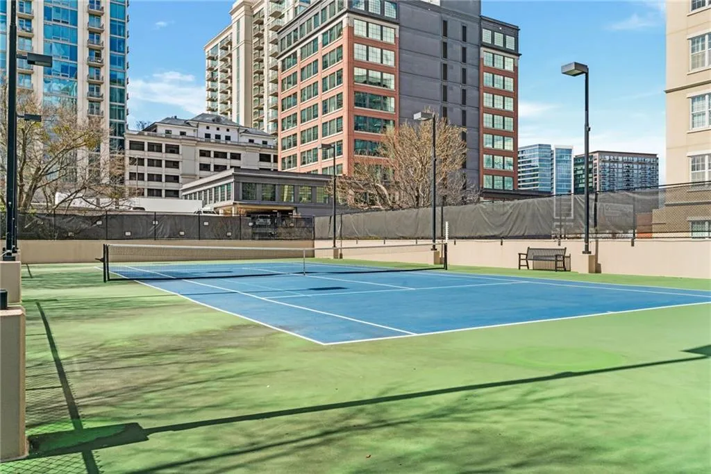 Amenities include a tennis court!