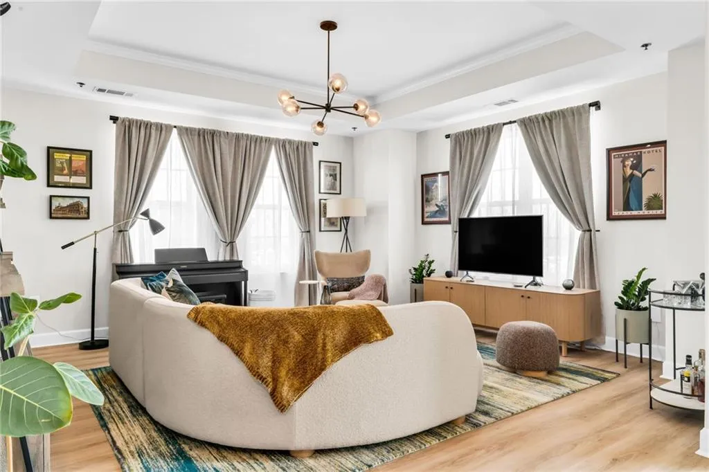 The living room is bright and deceptively large.