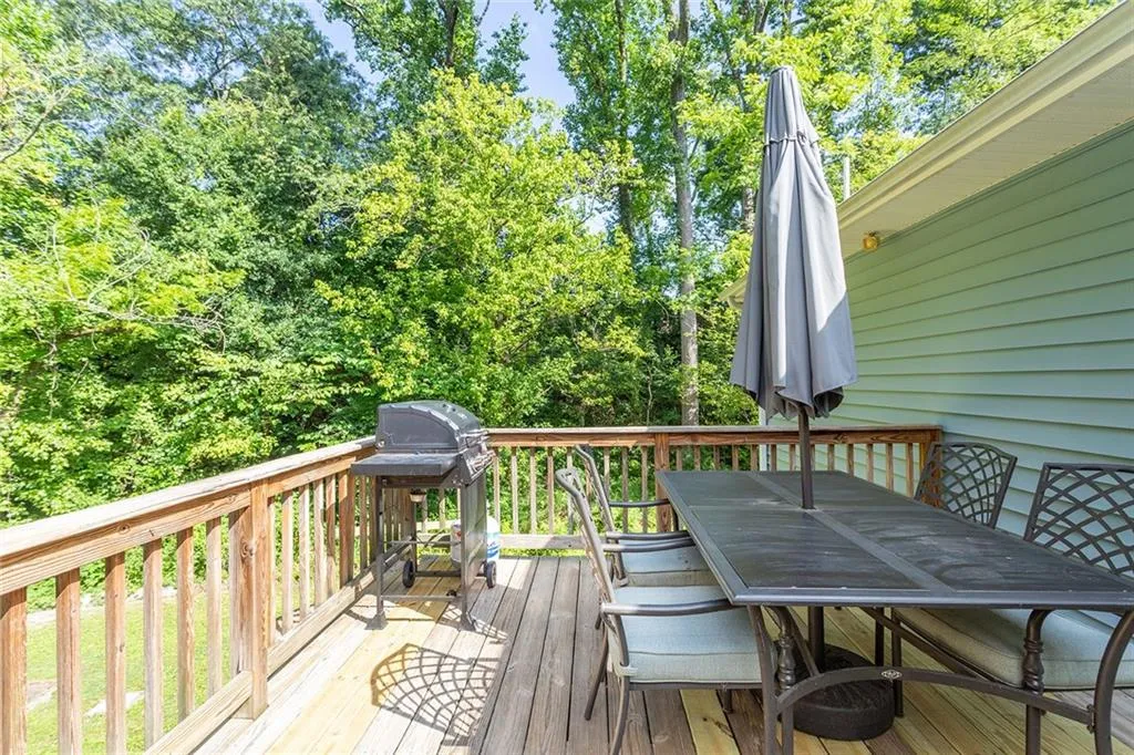 Side deck with views of the side yard and back yard.